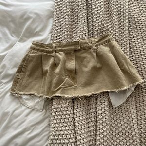 Tan khaki exposed pocket raw fray frayed hem mini skirt